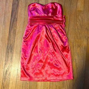 Hot pink strapless mini dress Zipper and bow on back and pockets! good condition